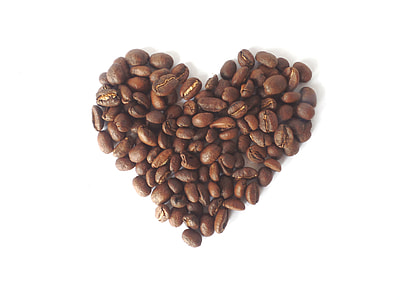 heart shaped coffee beans on white surface thumbnail