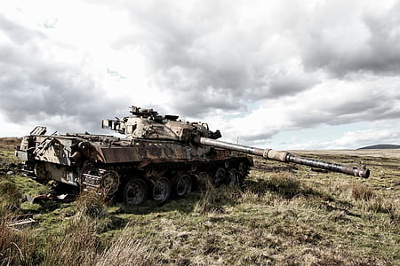 brown battle tank on mountain thumbnail