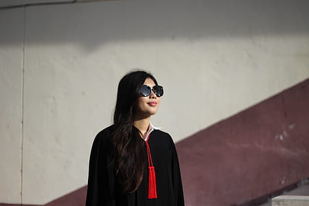 selective focus photograph of woman in black top thumbnail
