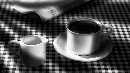 grayscale photography of teacup with saucer beside pitcher thumbnail