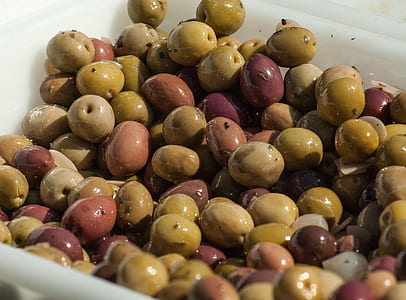 bunch of round fruits in white container thumbnail