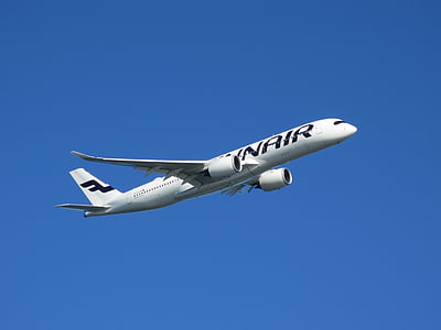 white commercial airplane in flight thumbnail