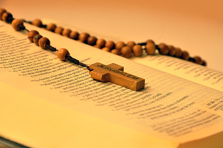 brown Rosary on Bible book thumbnail