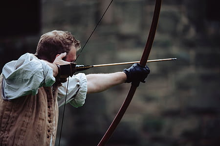 man using bow thumbnail