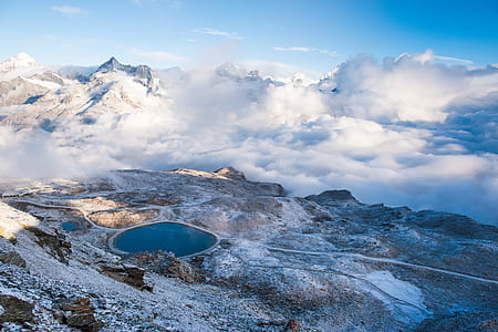 aerial view photography of snow mountain during daytime thumbnail