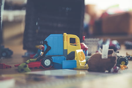 blue and yellow plastic toy truck thumbnail