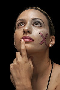 woman holding her lips thumbnail