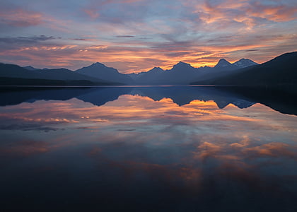 time lapse photography of white clouds over water thumbnail