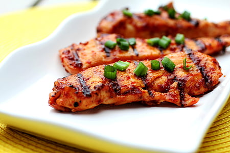 plate of three slices of grilled meats thumbnail
