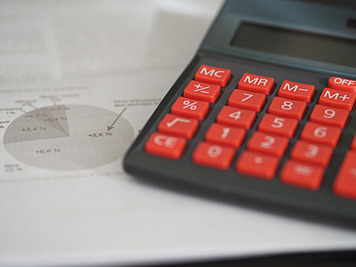 black and red electronic calculator beside a pie chart thumbnail