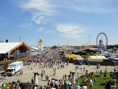 people gathered in carnival during daytime thumbnail