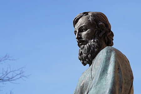 man statue during daytime thumbnail