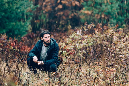 man in black jacket photo thumbnail