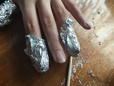 coil wrapping person's fingers on tbale thumbnail