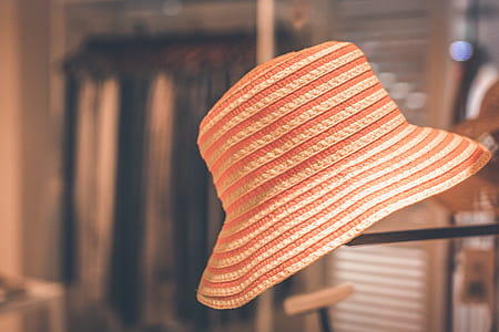 Selective Focus Photography of Orange Hat thumbnail