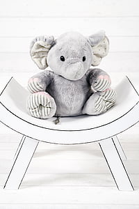 elephant plush toy on table thumbnail