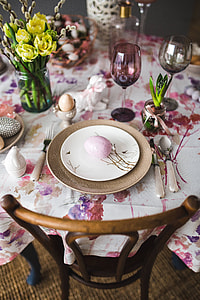 Easter table with cute pink decorations, flowers, catkins and eggs thumbnail