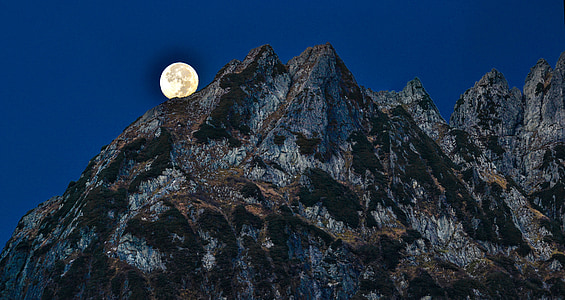 mountain during full moon thumbnail
