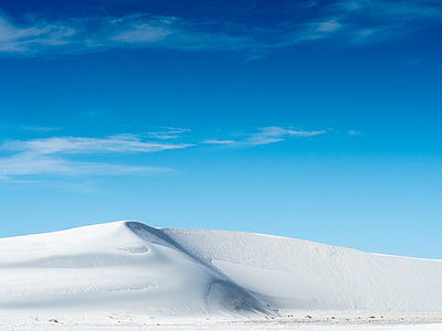 snowy mountain under cloudy sky during daytime thumbnail