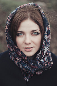 woman in blue, white, and red floral scarf thumbnail