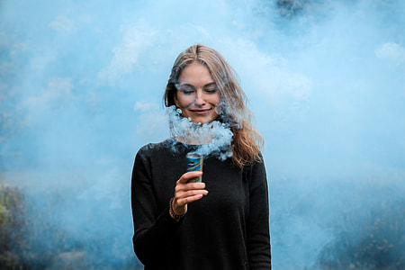 Woman with Hot Drink in black shirt thumbnail