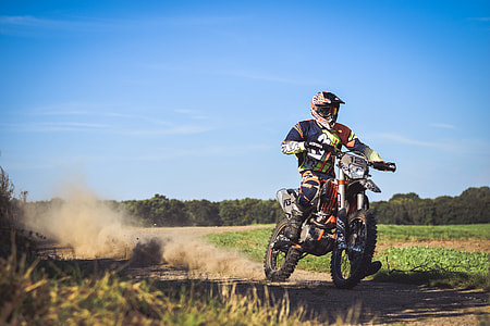 man riding motocross dirt bike thumbnail