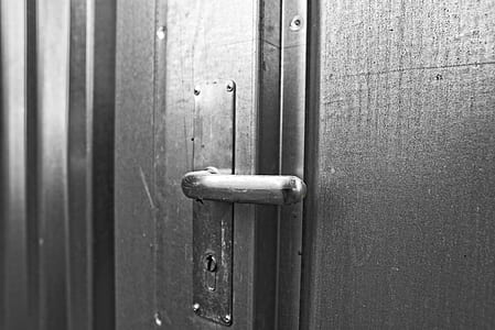 grayscale photo of door lever thumbnail