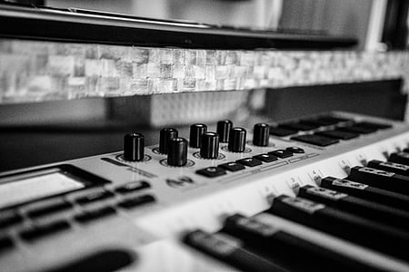 focus and grayscale photography of audio mixer thumbnail