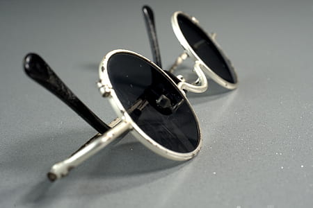 black sunglasses with white frames thumbnail