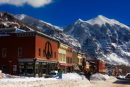 buildings near mountain thumbnail