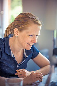 woman surfing on laptop inside room thumbnail