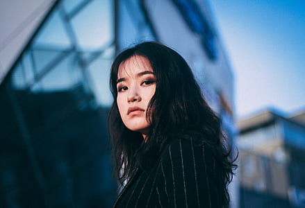 selective focus photography of woman in black top thumbnail