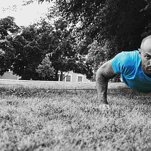 selective color photography of blue crew-neck t-shirt thumbnail