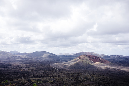 green mountain under white clouds thumbnail