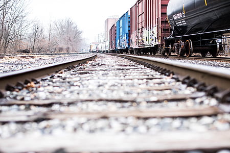 selective focus photography of train in railway thumbnail