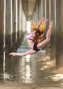 woman jumping on water thumbnail