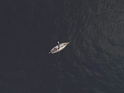 Top View Photography of Sailboat thumbnail