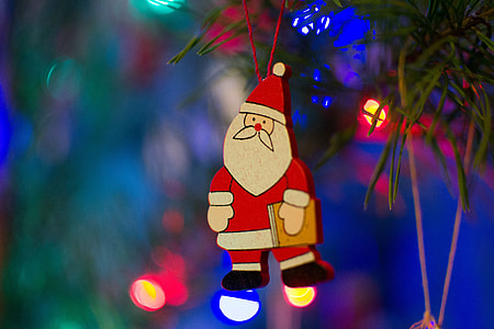 Santa Claus decoration on a Christmas tree thumbnail