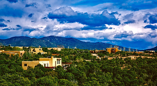Landscape with houses with lots of clouds in Santa Fe, Clouds thumbnail