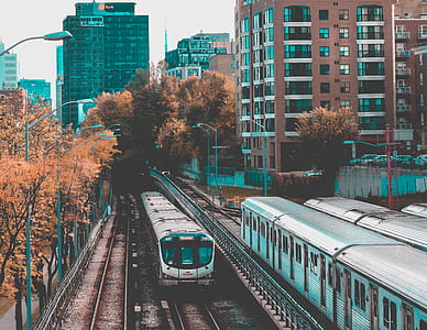 train on train rails during daytime thumbnail