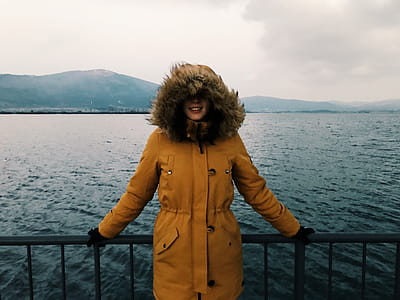 Woman in Yellow Winter Jacket thumbnail