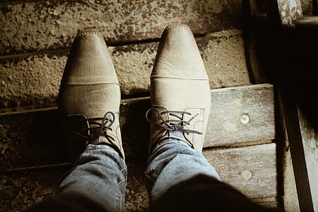 person wearing pair of gray dress shoes thumbnail