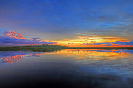 lake surrounded with trees thumbnail