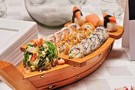 brown wooden sushimi tray with sushis thumbnail