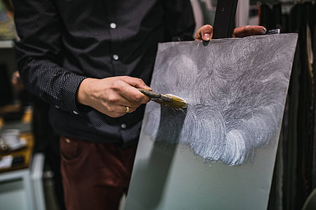 People painting on canvas thumbnail