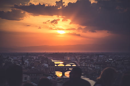 aerial photograph of town during golden hour thumbnail