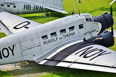 gray Rudolf Von Thuna monoplane on land during daytime thumbnail