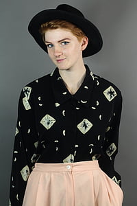 woman wearing black and white button-up long-sleeved collared shirt thumbnail