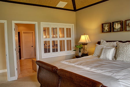 closeup photo of brown wooden bed frame and white wooden door open thumbnail