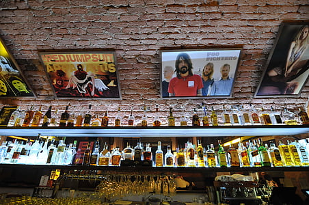 assorted-brand liquor bottles on shelf thumbnail